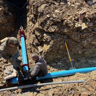 2026-03-24 Main Water Line into Lodge